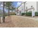 Charming townhomes with well-maintained landscaping and inviting entrances at 1311 Canyon Rock Ct # 105, Raleigh, NC 27610