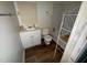 Functional bathroom with a vanity, toilet, and tub with shower combination at 1324 Buffalo Rd, Smithfield, NC 27577