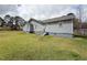 Charming single-story home featuring light blue siding and a spacious yard, perfect for outdoor activities and relaxation at 1324 Buffalo Rd, Smithfield, NC 27577