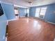 Inviting living room with wood floors, freshly painted walls, and natural light at 1324 Buffalo Rd, Smithfield, NC 27577