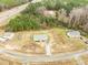 An aerial view of the property showcases its location and surrounding landscape at 15 Golden Poppy Ln, Youngsville, NC 27596