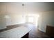 Bright, open-concept space with hardwood floors; perfect for entertaining or relaxing at 15 Golden Poppy Ln, Youngsville, NC 27596