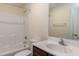 Bathroom featuring a vanity with a sink, toilet, and a shower-tub combination at 151 Goose Creek Cir, Dunn, NC 28334