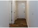 Inviting hallway with neutral walls and modern wood-look flooring at 151 Goose Creek Cir, Dunn, NC 28334