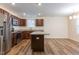 Modern kitchen featuring stainless steel appliances and a central island at 151 Goose Creek Cir, Dunn, NC 28334