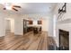 Open-concept living space seamlessly integrates the kitchen and living areas at 151 Goose Creek Cir, Dunn, NC 28334