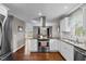 Well-appointed kitchen featuring stainless steel appliances, granite countertops, and an open design with bright natural light at 1965 Wedgewood Dr, Sanford, NC 27332
