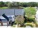 Aerial view of a lovely townhome that backs to a picturesque lake at 200 Nottinghill Walk, Apex, NC 27502