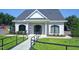 Well-maintained clubhouse with manicured lawn and attractive stone exterior at 200 Nottinghill Walk, Apex, NC 27502