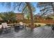 Backyard deck with outdoor seating and a fire pit, perfect for entertaining, with a view of the house at 204 Arnold Ln, Fuquay Varina, NC 27526