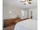Bedroom with dresser, closet, and attached bathroom for convenience at 204 Arnold Ln, Fuquay Varina, NC 27526