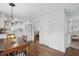 View of the dining area leading to the kitchen and living room at 204 Arnold Ln, Fuquay Varina, NC 27526