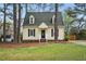 Charming two-story home with a well-maintained lawn and inviting front entrance at 204 Arnold Ln, Fuquay Varina, NC 27526