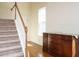 Inviting entryway features hardwood floors, staircase and lots of natural light at 2217 Magnolia Tree Ln, Durham, NC 27703