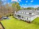 An aerial view of the backyard showing the outdoor living space and hot tub at 2223 Winston Cir, Apex, NC 27502