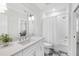 Clean bathroom with white vanity, shower with tub, and sleek fixtures at 2223 Winston Cir, Apex, NC 27502