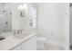 Bright bathroom with marble counters, modern fixtures, and a glass-enclosed shower at 2223 Winston Cir, Apex, NC 27502