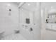 Luxury bathroom with oversized tile shower, built in shelving and glass shower door at 2223 Winston Cir, Apex, NC 27502