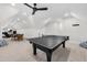 Attic game room featuring a ping pong table and a fitness area at 2223 Winston Cir, Apex, NC 27502