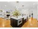 Modern kitchen island with stainless steel appliances, offering a convenient and stylish space for cooking and entertaining at 2223 Winston Cir, Apex, NC 27502