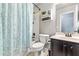 Bright bathroom with a shower and tub combination, complemented by a decorative shelf at 240 Swann Trl, Clayton, NC 27527