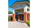 Entrance to Riverwood Athletic Club with brick columns and well-maintained landscaping at 240 Swann Trl, Clayton, NC 27527
