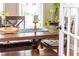 Close-up of dining table featuring stylish decor, soft cushions, and inviting atmosphere at 240 Swann Trl, Clayton, NC 27527