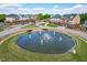 Circular fountain with statuary encircled by neighborhood streets and multi-Gathering homes at 240 Swann Trl, Clayton, NC 27527
