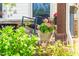Close-up of the charming porch with potted flowers, providing a welcoming touch at 240 Swann Trl, Clayton, NC 27527