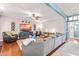 Inviting living room with a large sectional sofa, and modern decor accents at 240 Swann Trl, Clayton, NC 27527