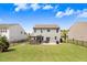 Expansive backyard with a deck, patio, and generous lawn at 245 Naples Ln, Clayton, NC 27527
