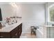 Bright bathroom with double vanity, soaking tub, and neutral finishes at 245 Naples Ln, Clayton, NC 27527