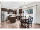 Open kitchen features stainless steel appliances, granite countertops, and a breakfast nook at 245 Naples Ln, Clayton, NC 27527