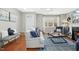 Comfortable living room with fireplace, neutral color palette and stylish furniture at 2728 Cloud Mist Cir, Raleigh, NC 27614
