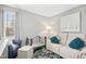 Cozy living room boasts a comfortable sofa, stylish decor, and plenty of natural light at 2728 Cloud Mist Cir, Raleigh, NC 27614