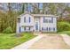Inviting two-story home with a well-maintained lawn and a spacious driveway at 2816 Delco Ct, Raleigh, NC 27610