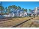 View of home from the backyard and showing the fencing and home features at 286 Sea Mist Dr, Sanford, NC 27332