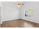 Bright bedroom features luxury vinyl flooring, a large window, and neutral color palette at 286 Sea Mist Dr, Sanford, NC 27332