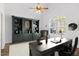 Well-appointed home office with custom built-ins, a large window, and a cozy seating area at 286 Sea Mist Dr, Sanford, NC 27332