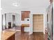Kitchen pantry and adjacent fireplace give this home a cozy feel at 286 Sea Mist Dr, Sanford, NC 27332