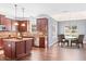 Spacious kitchen and dining area feature a kitchen island with granite countertops at 286 Sea Mist Dr, Sanford, NC 27332