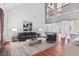 Bright and airy living room featuring a soaring ceiling, and a cozy seating arrangement at 286 Sea Mist Dr, Sanford, NC 27332