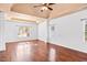 Spacious main bedroom features tray ceiling, ceiling fan, and two large windows at 286 Sea Mist Dr, Sanford, NC 27332