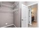 Spacious walk-in closet with wood-look flooring and multiple wire shelves at 286 Sea Mist Dr, Sanford, NC 27332