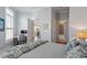 Bright bedroom with a desk, chair, and plantation shutters, offering a comfortable workspace at 317 W Morgan St # 317, Raleigh, NC 27601