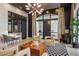 Inviting lobby with modern furniture, a stylish rug, and elegant lighting fixtures at 317 W Morgan St # 317, Raleigh, NC 27601