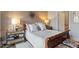 Well-appointed main bedroom with stylish decor and an adjacent bathroom at 317 W Morgan St # 317, Raleigh, NC 27601