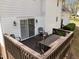 Exterior view of the back deck with outdoor seating at 323 E Stratford Dr, Henderson, NC 27537