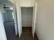 A walk-in closet with shelving, ready to store your belongings and keep your home clutter-free at 37 Furley St., Homesite 38, Sanford, NC 27330