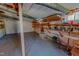 Unfinished basement space with exposed ductwork, shelving, and a window for natural light at 382 Wimbledon Dr, Roxboro, NC 27573